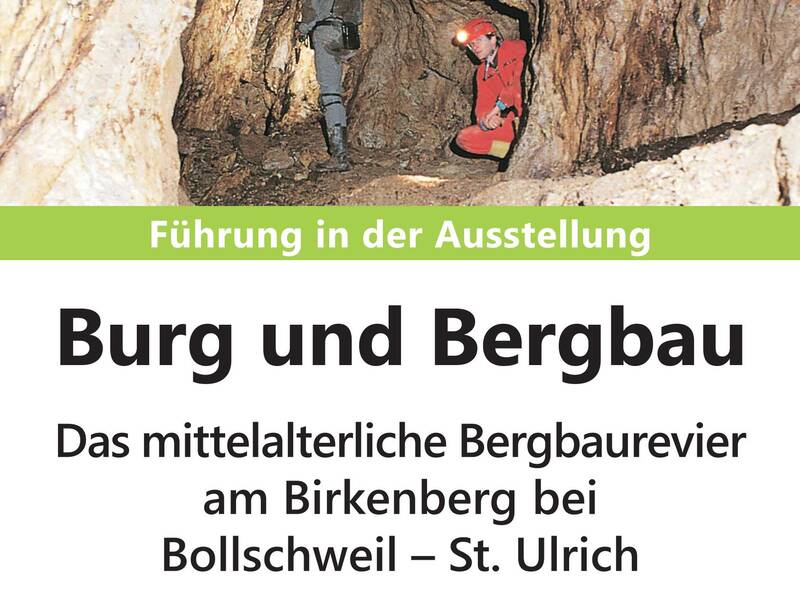 Ein Plakat wirbt für eine Führung in der Ausstellung "Burg und Bergbau" am 18. Oktober 2026 um 15:00 Uhr mit einem Bild von zwei Personen in einem Bergwerksstollen.